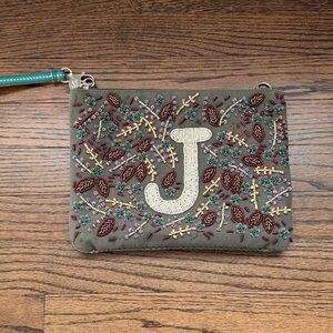 America & Beyond beaded initial pouch with a "J" on the front